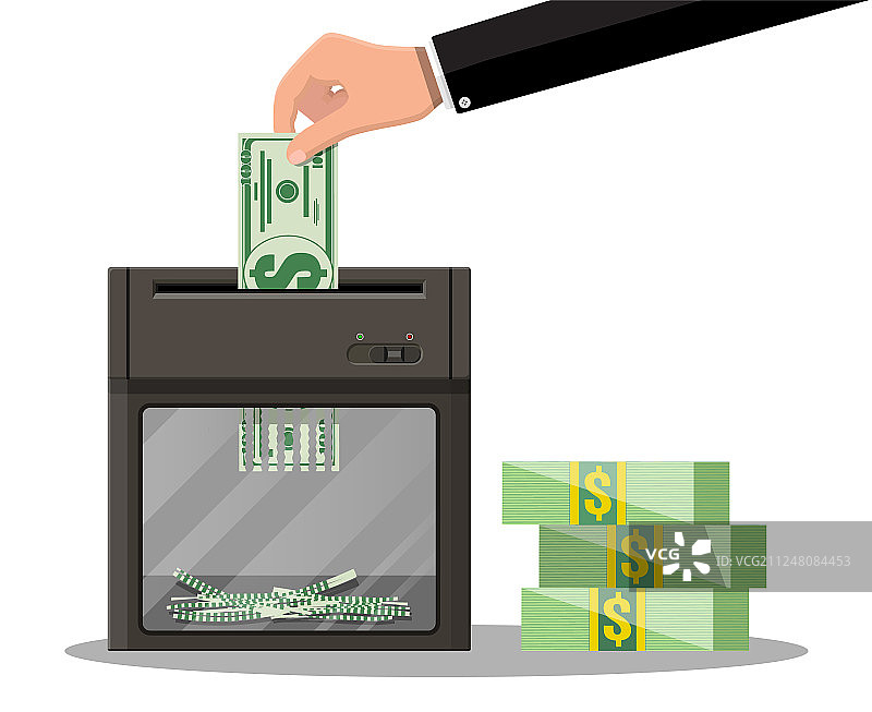 手将美元纸币放入碎纸机图片素材