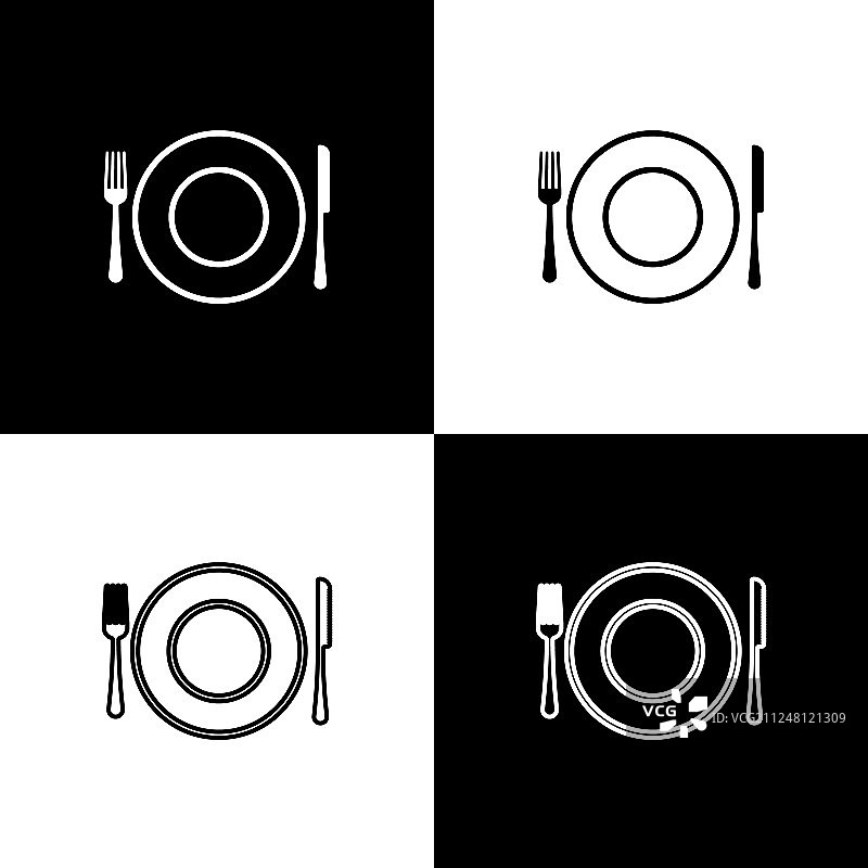 黑色背景上的餐盘刀叉图标图片素材