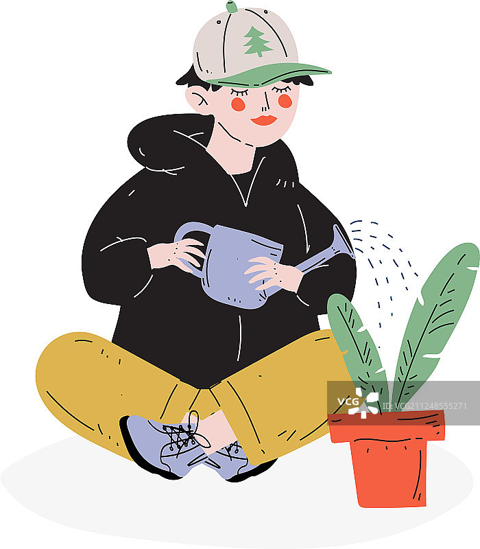 给室内植物浇水的男孩图片素材
