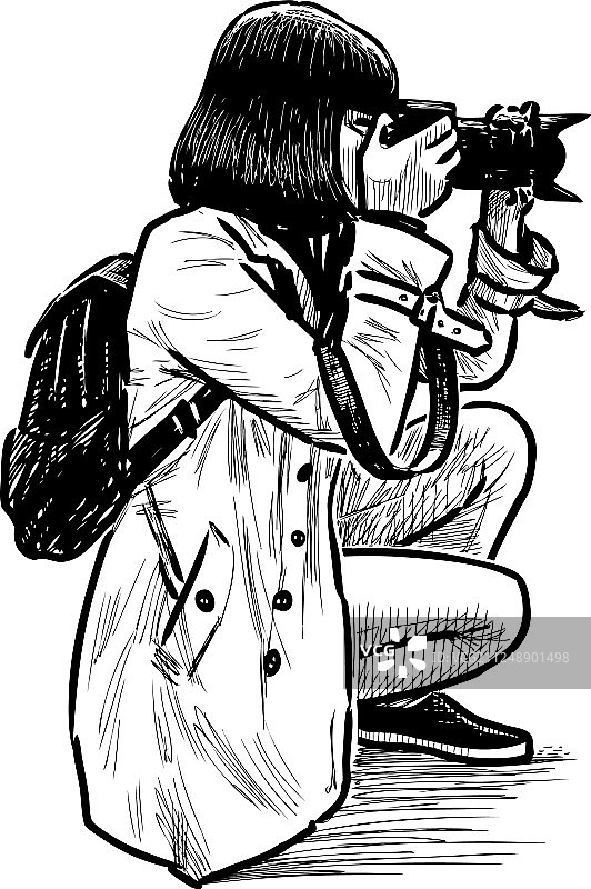 女孩摄影师在拍照图片素材