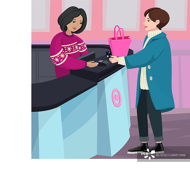 年轻漂亮的女人在付款图片素材