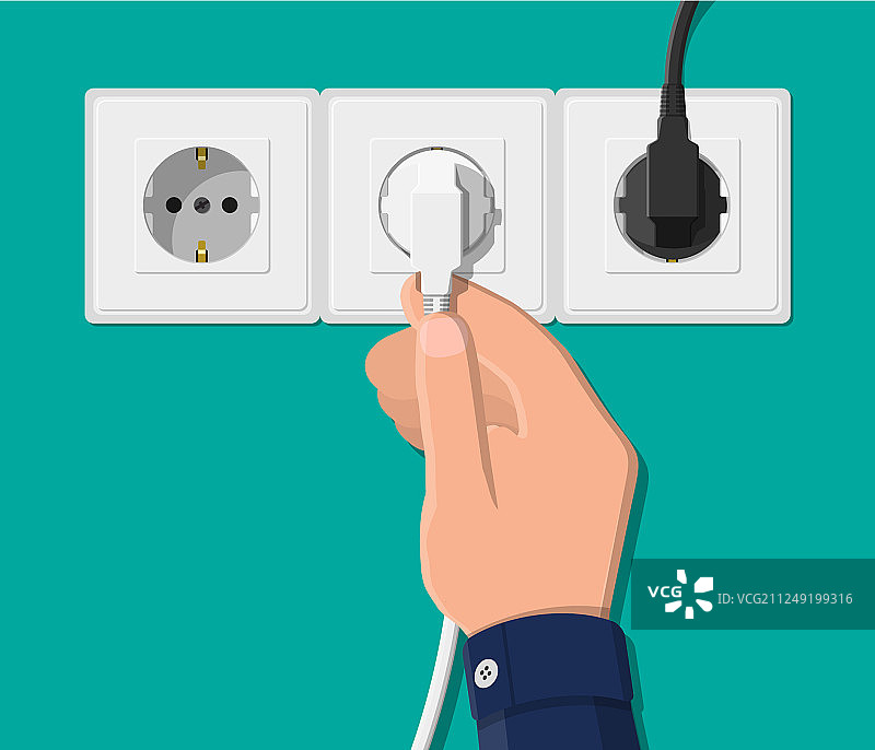 电源插座和带插头的手图片素材