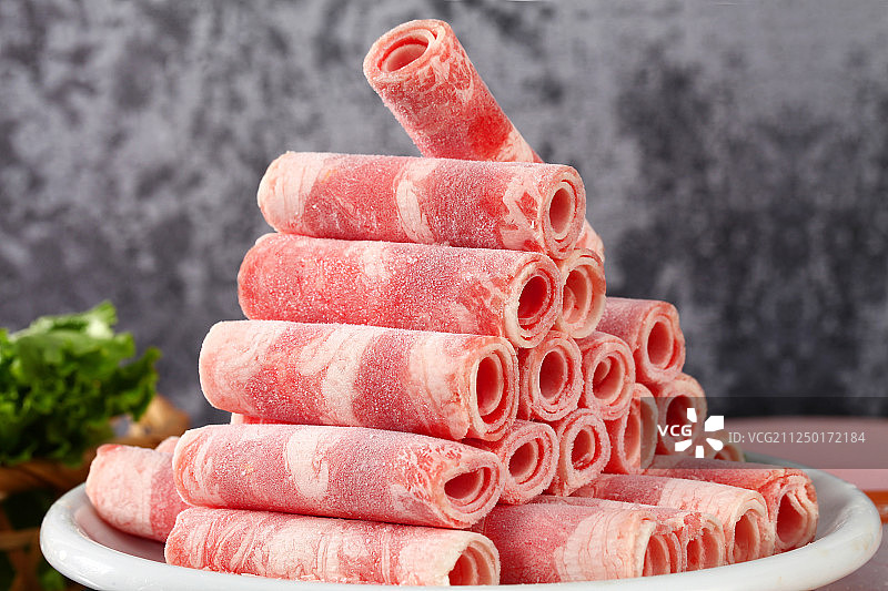 堆放整齐的肉卷图片素材