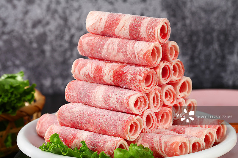 堆放整齐的肉卷图片素材