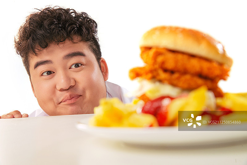 小胖子想吃汉堡包图片素材