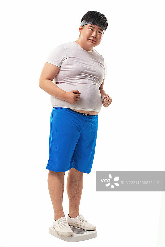 小胖称体重图片素材