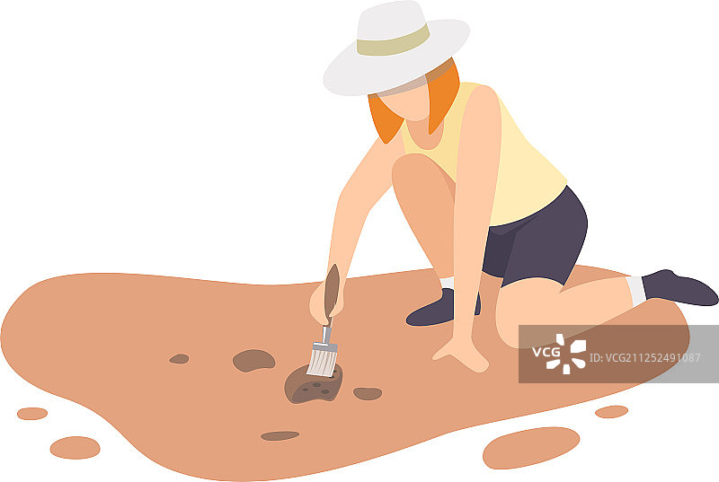 坐在地上的女考古学家图片素材