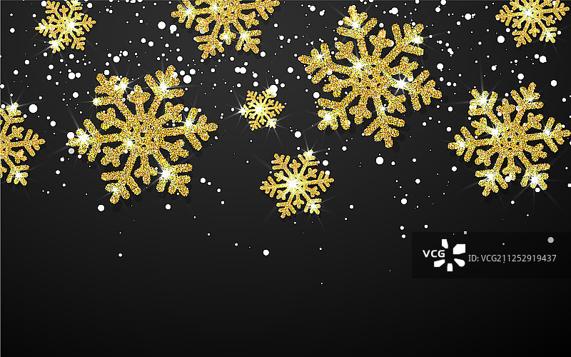 黑色背景上的闪亮金色雪花图片素材