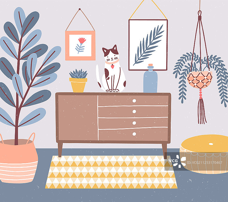 房间内部，猫坐在抽屉柜上图片素材
