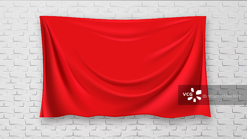 砖红色帆布墙上的画图片素材