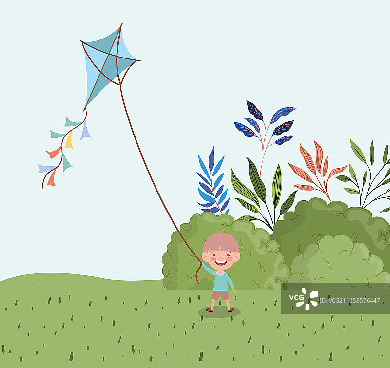 在风景中放风筝的快乐小男孩图片素材