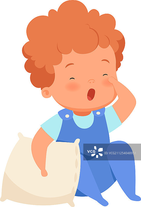 男孩抱着枕头想睡觉图片素材