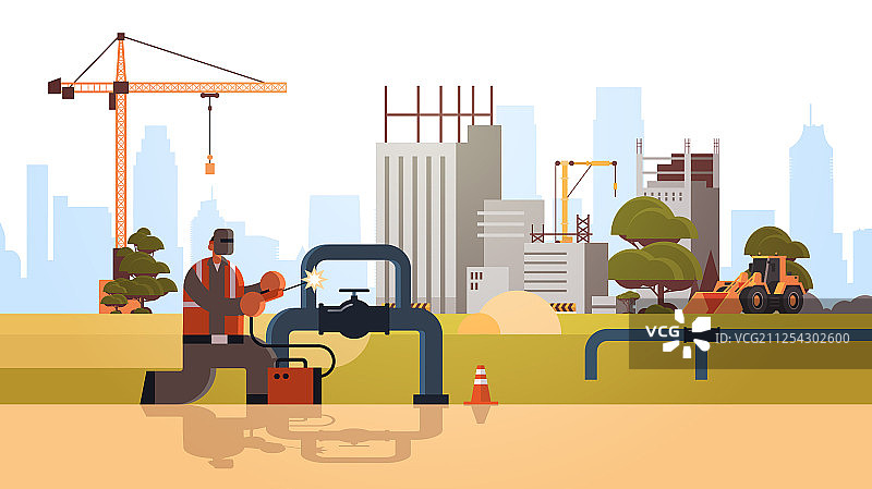 戴防护面罩的焊工焊接大型钢管图片素材