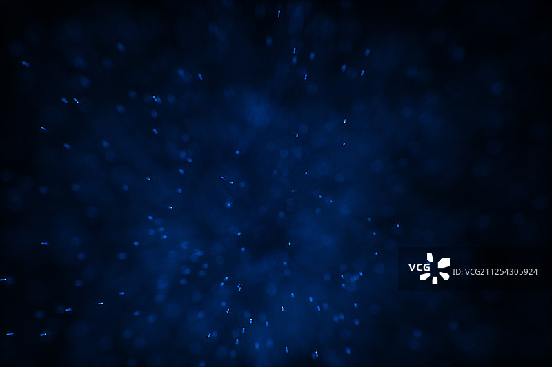 黑暗环境里的发光粒子 三维渲染图片素材