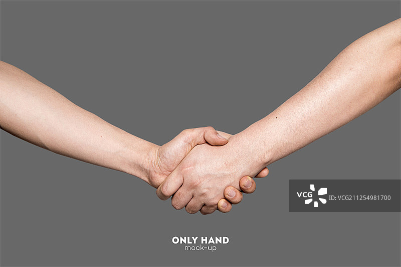 握手，隔离在灰色背景上图片素材
