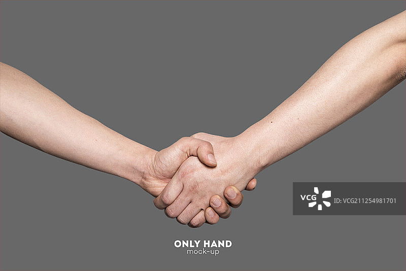 握手，隔离在灰色背景上图片素材