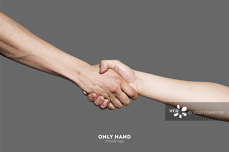握手，隔离在灰色背景上图片素材