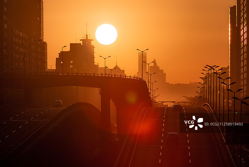 春分时节，北京三里河立交桥日出图片素材