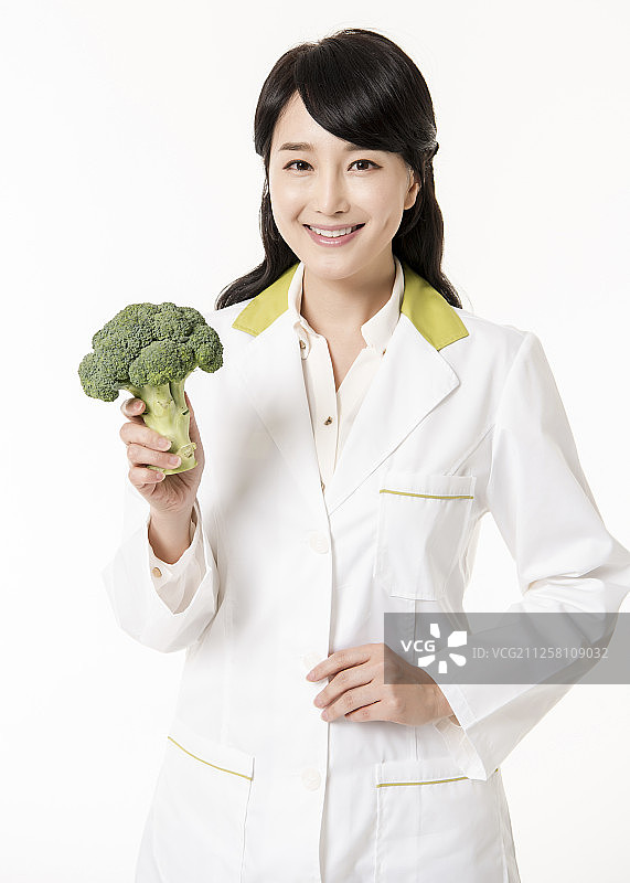 营养师手 holding 花椰菜摄影作品图片素材