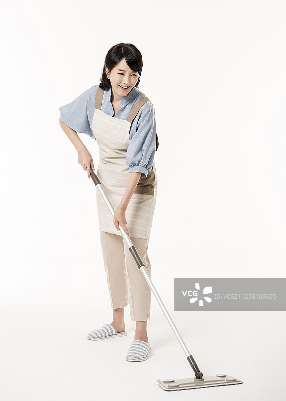 家庭主妇用拖把清洁卫生摄影图片素材
