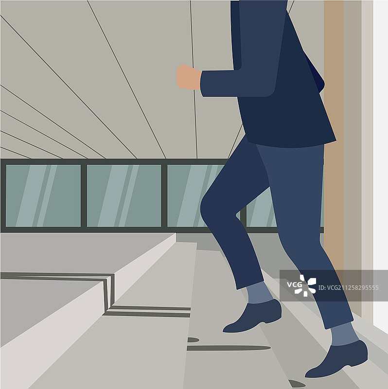 年轻英俊的商务男士走上楼梯图片素材