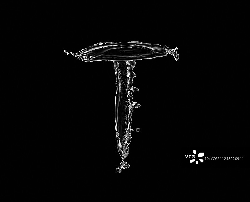 黑色背景水形状字母T图片素材