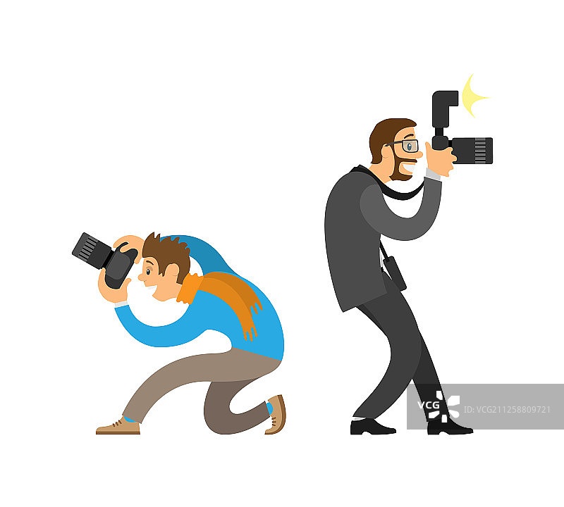 摄影师和携带数码相机的记者图片素材