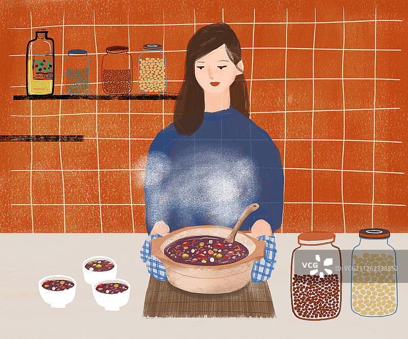 厨房里端着腊八粥的女人图片素材