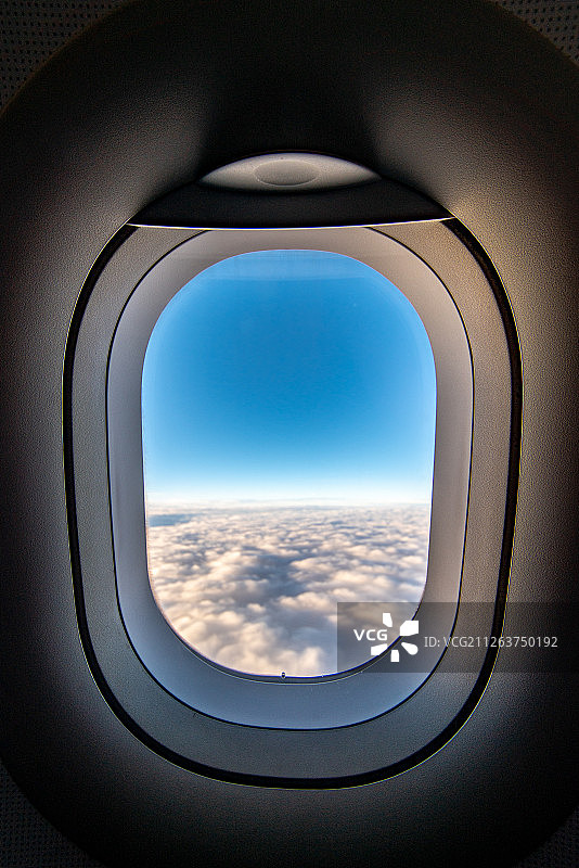 飞机舷窗外的日落图片素材