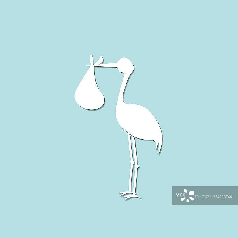 白鹳 carrying 可爱的宝宝图片素材