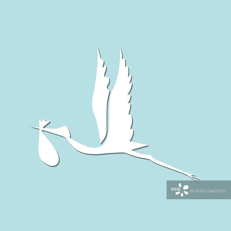 白鹳 carrying 可爱的宝宝图片素材