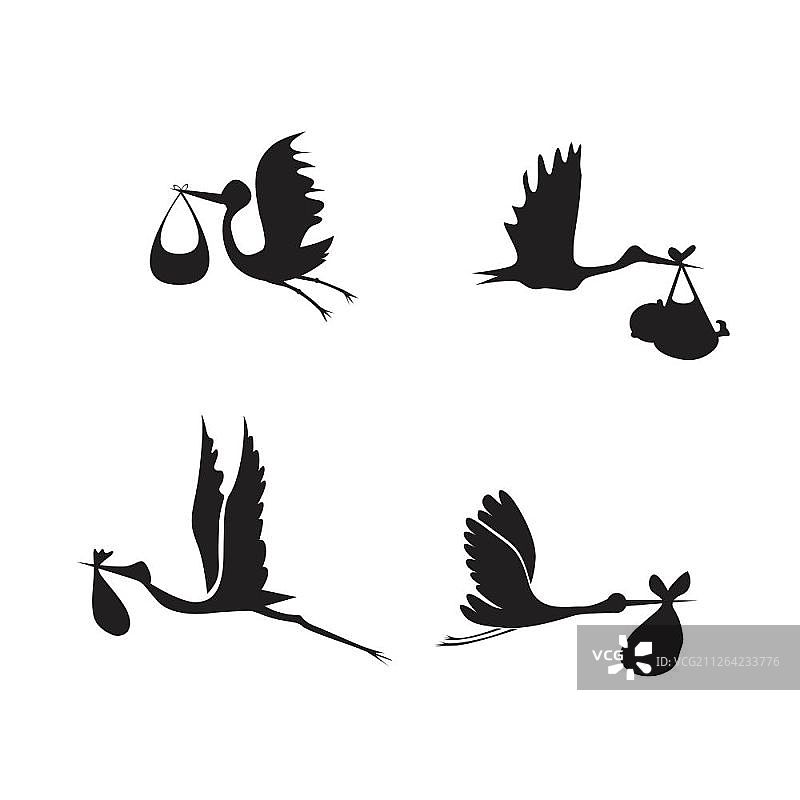 黑白背景上的鹳鸟和婴儿图片素材