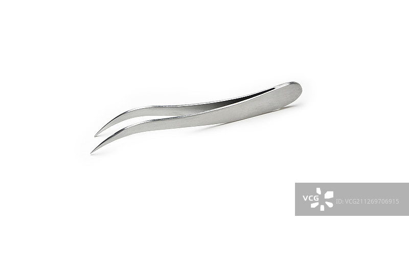 白色背景上的金属镊子图片素材
