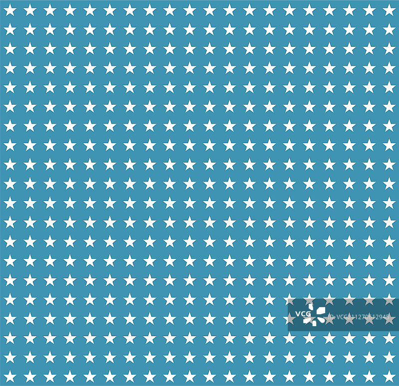 蓝色背景上的白色星星图案图片素材