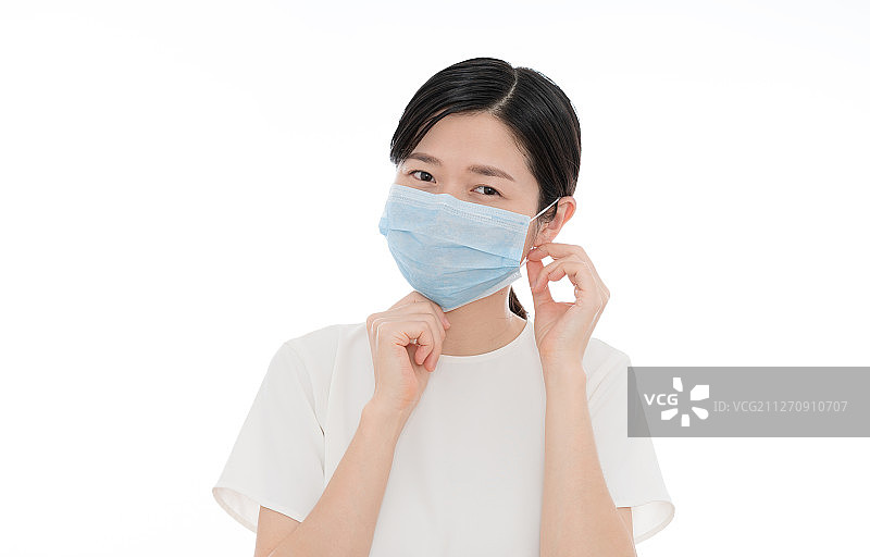 戴蓝色口罩戴女生图片素材