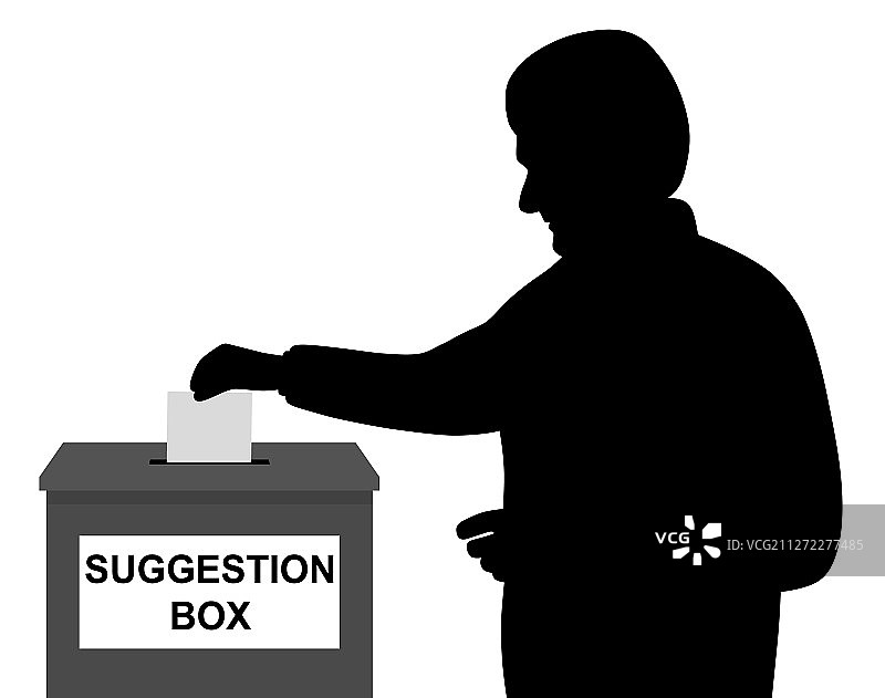 男人将纸张放入意见箱图片素材