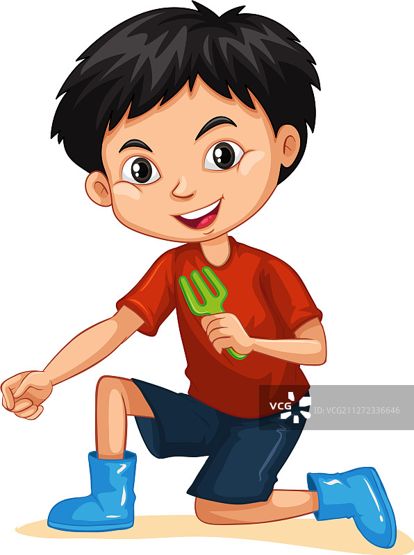 一个快乐的男孩拿着园艺叉图片素材