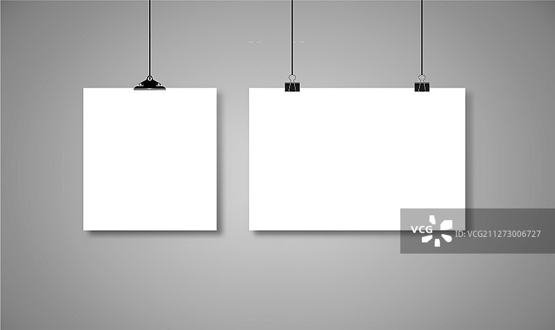 挂在带黑色绳子的活页夹上的白纸图片素材