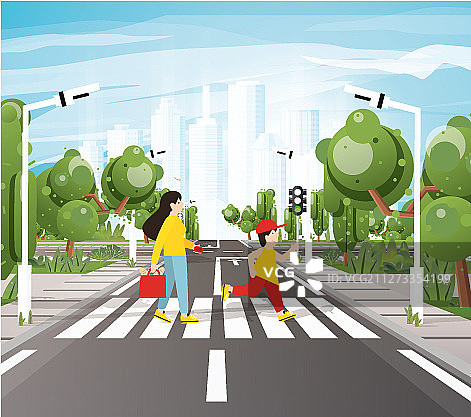 母亲和儿子在人行横道上过马路图片素材