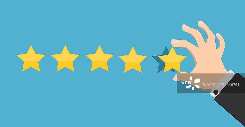 手将五颗金星放蓝色背景上图片素材