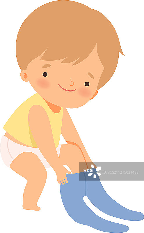 正在打扮自己的小男孩图片素材