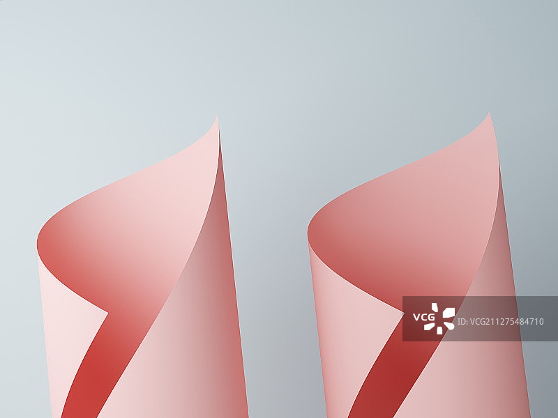 卷曲的粉色卡纸排列组合形成的抽象背景素材图片素材