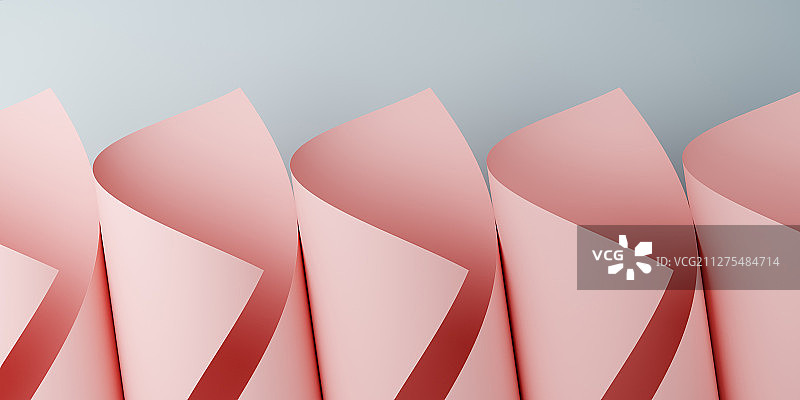 卷曲的粉色卡纸排列组合形成的抽象背景素材图片素材