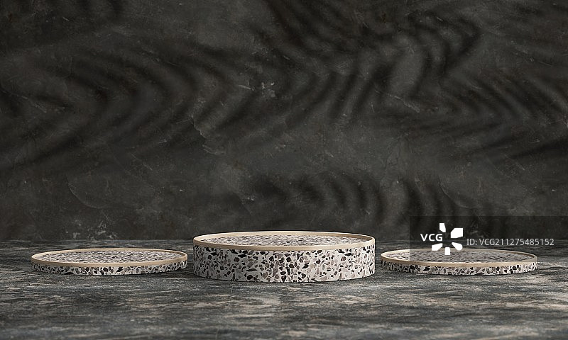 树影下典雅的水磨石材质产品展示台图片素材