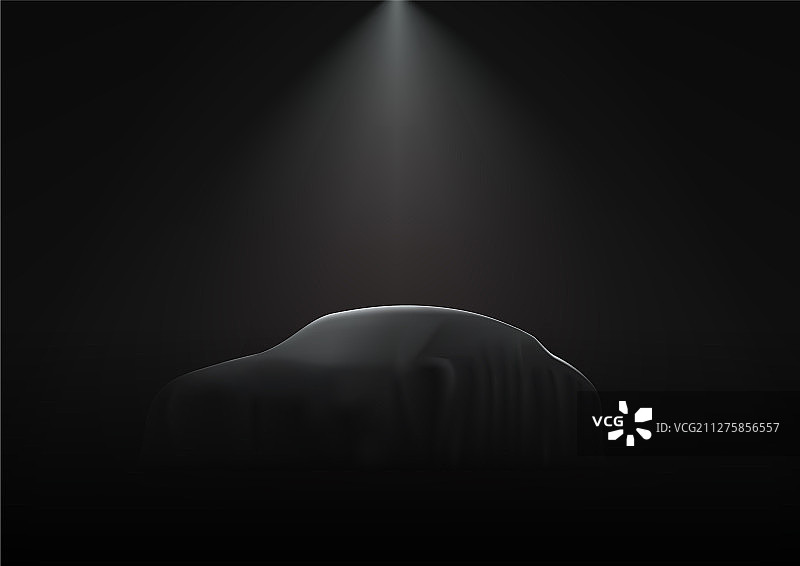黑色背景中被深色布料覆盖的汽车图片素材