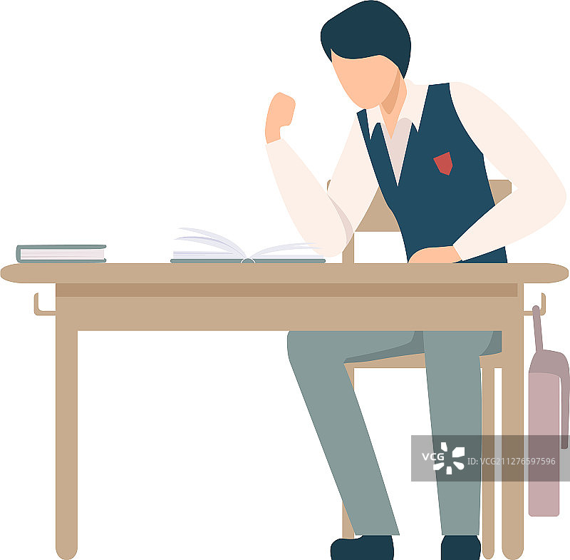 男孩坐在课桌旁准备打架图片素材