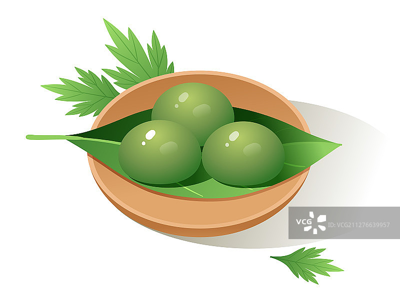 艾草和盘子里的三个青团图片素材