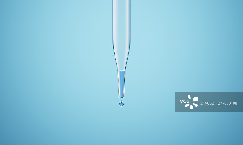 用滴管向试管中滴入蓝色的液体图片素材