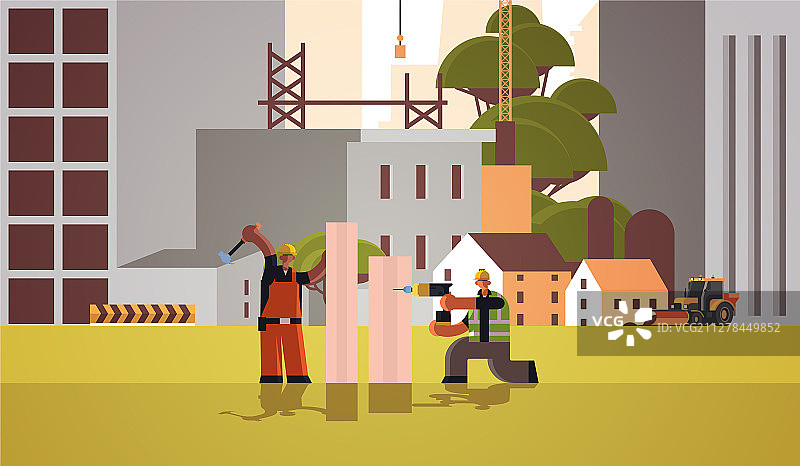 使用钻头和锤子的建筑工人夫妇图片素材