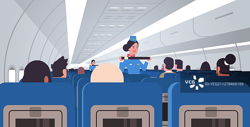 空姐讲解乘客如何使用座椅图片素材